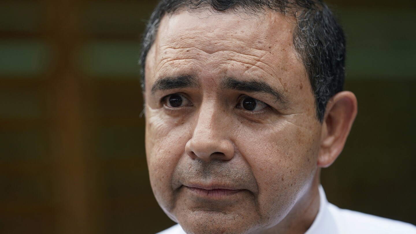 Texas Rep. Henry Cuellar carjacked by three armed attackers near Capitol | AP News