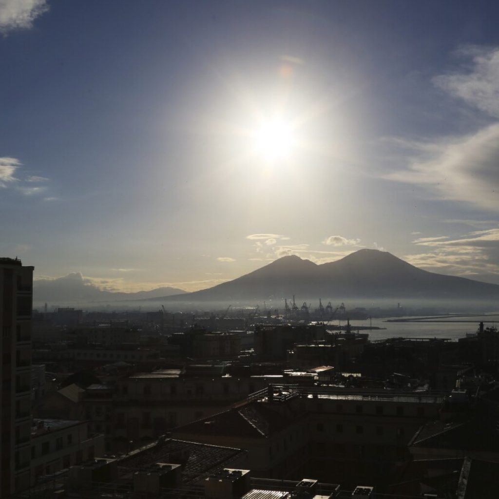 A string of volcanic tremors raises fears of mass evacuations in Italy | AP News