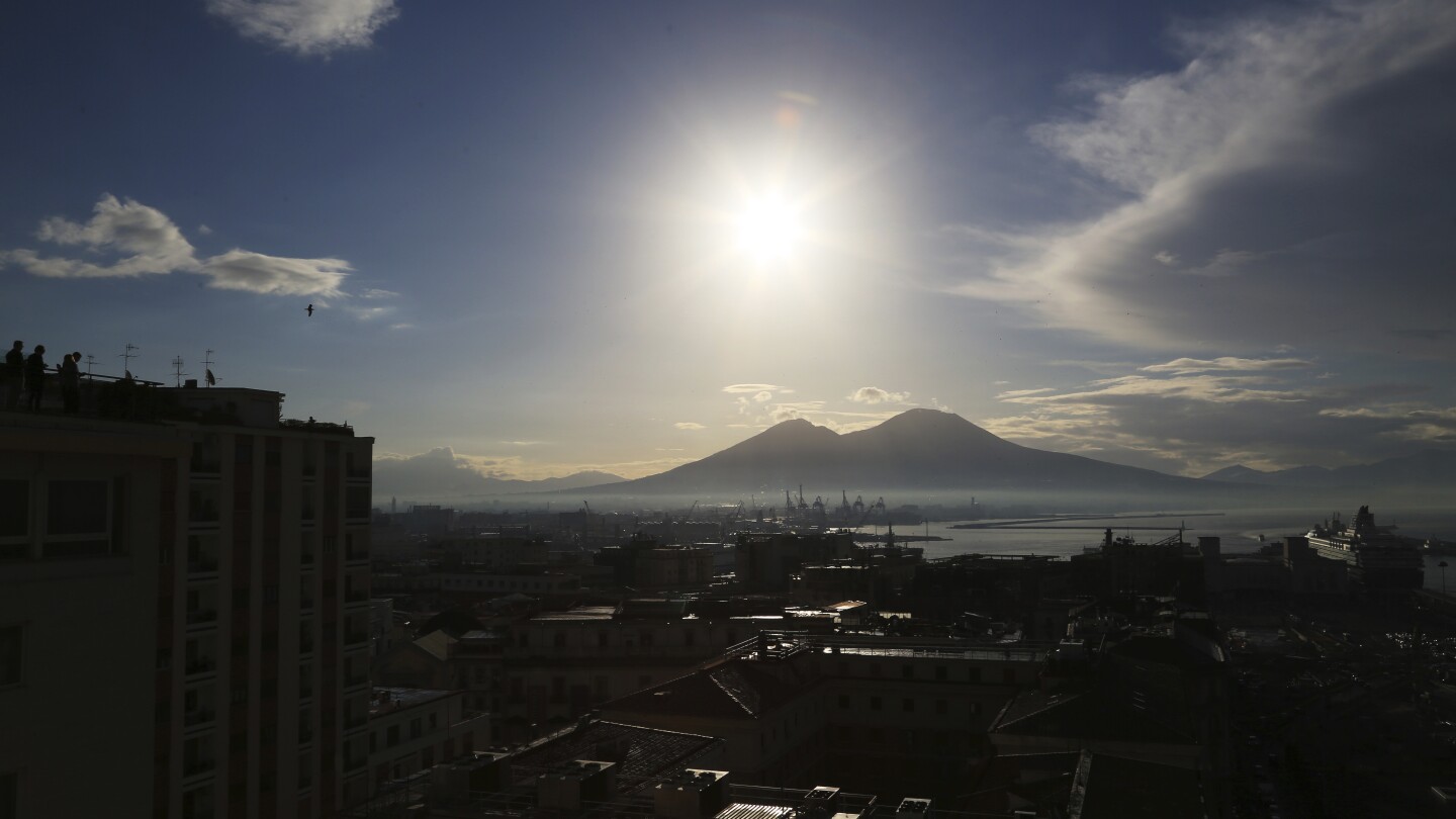 A string of volcanic tremors raises fears of mass evacuations in Italy | AP News