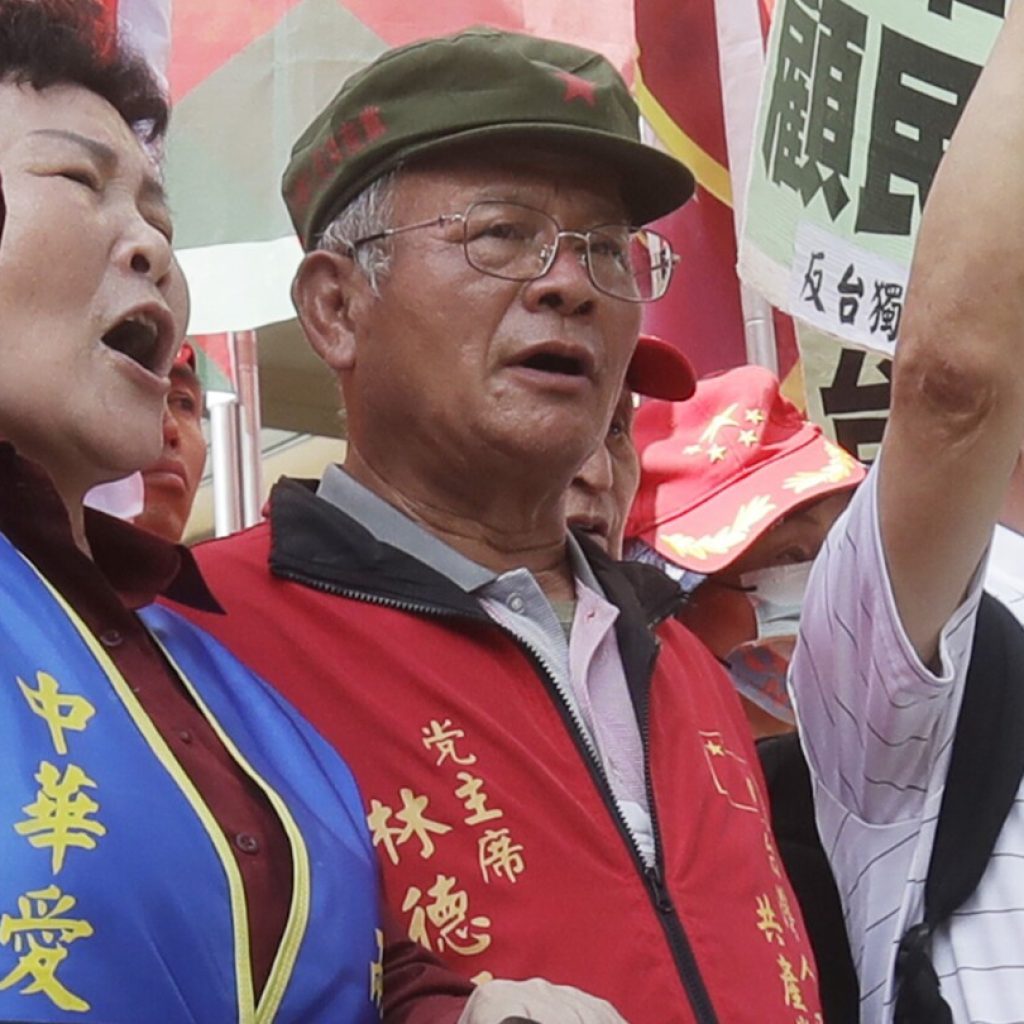 Taiwan indicts 2 communist party members accused of colluding with China to influence elections | AP News