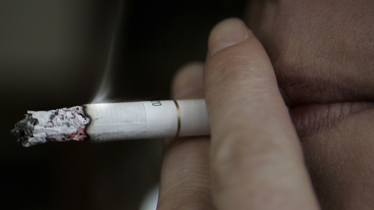 UK prime minister wants to raise the legal age to buy cigarettes in England so eventually no one can | AP News