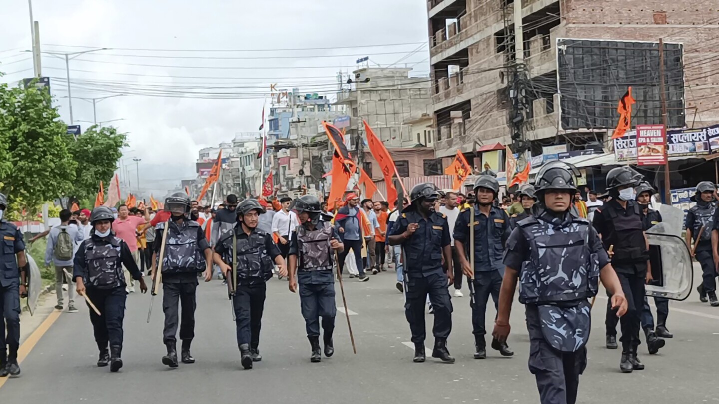 A Nepal town imposes a lockdown and beefs up security to prevent clashes between Hindus and Muslims | AP News