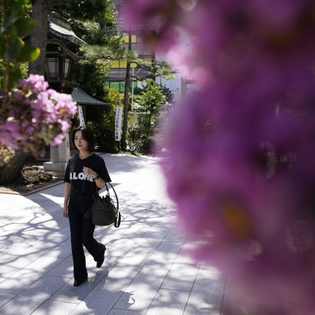 In secular Japan, what draws so many to temples and shrines? Stamp collecting and tradition | AP News