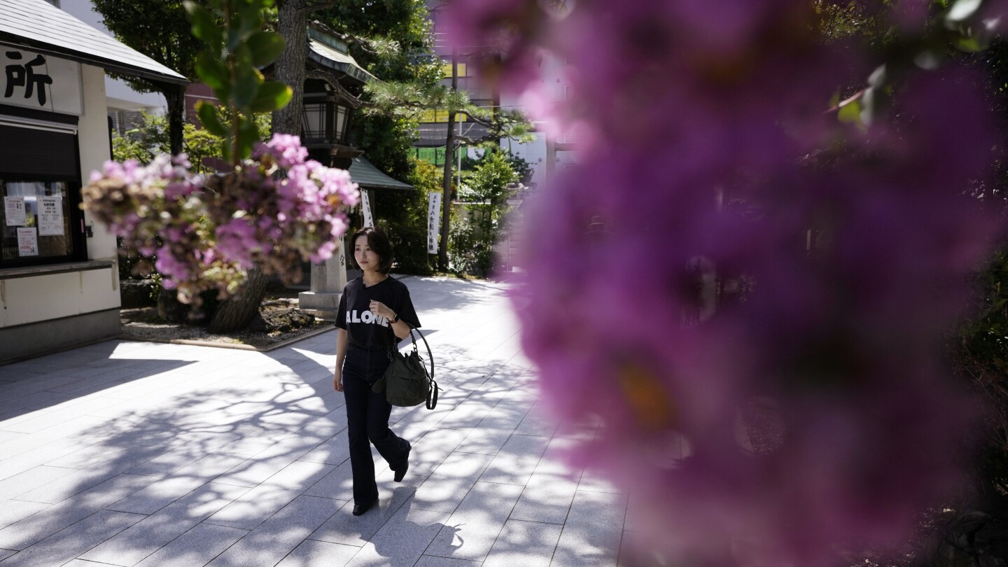 In secular Japan, what draws so many to temples and shrines? Stamp collecting and tradition | AP News