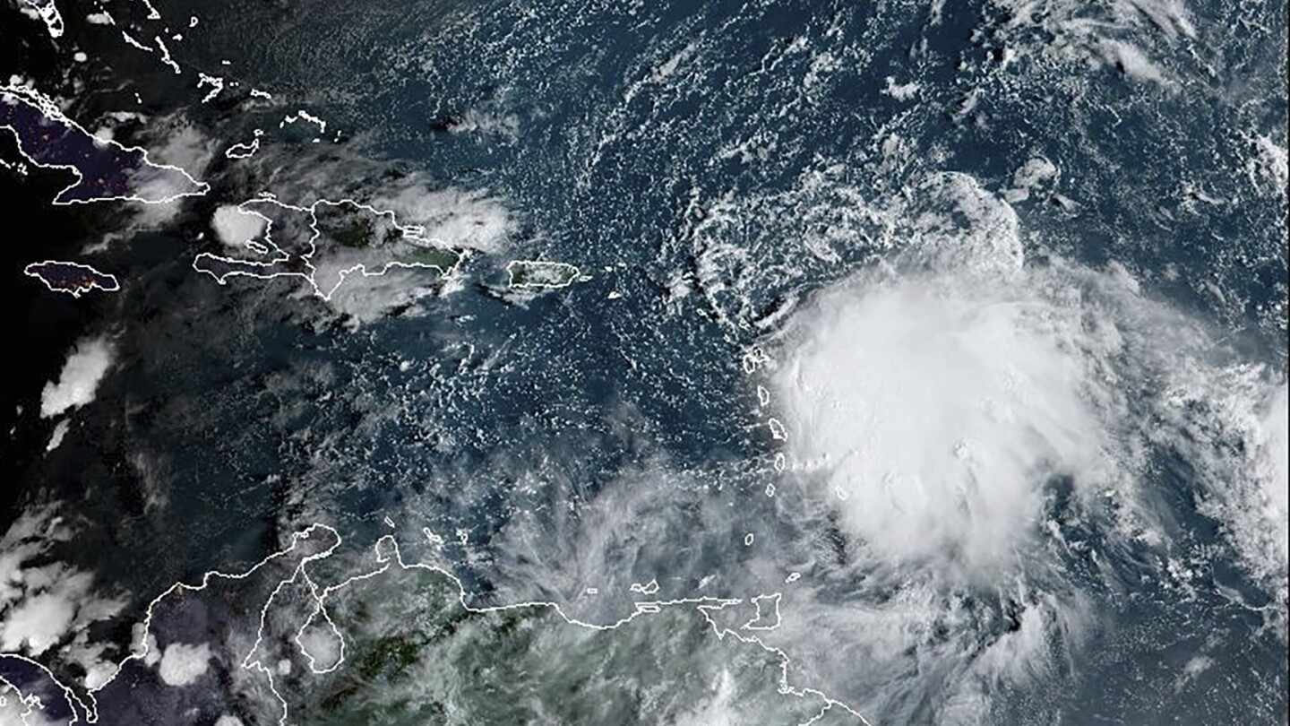Tropical Storm Philippe chugs toward Bermuda on a path to Atlantic Canada and New England | AP News