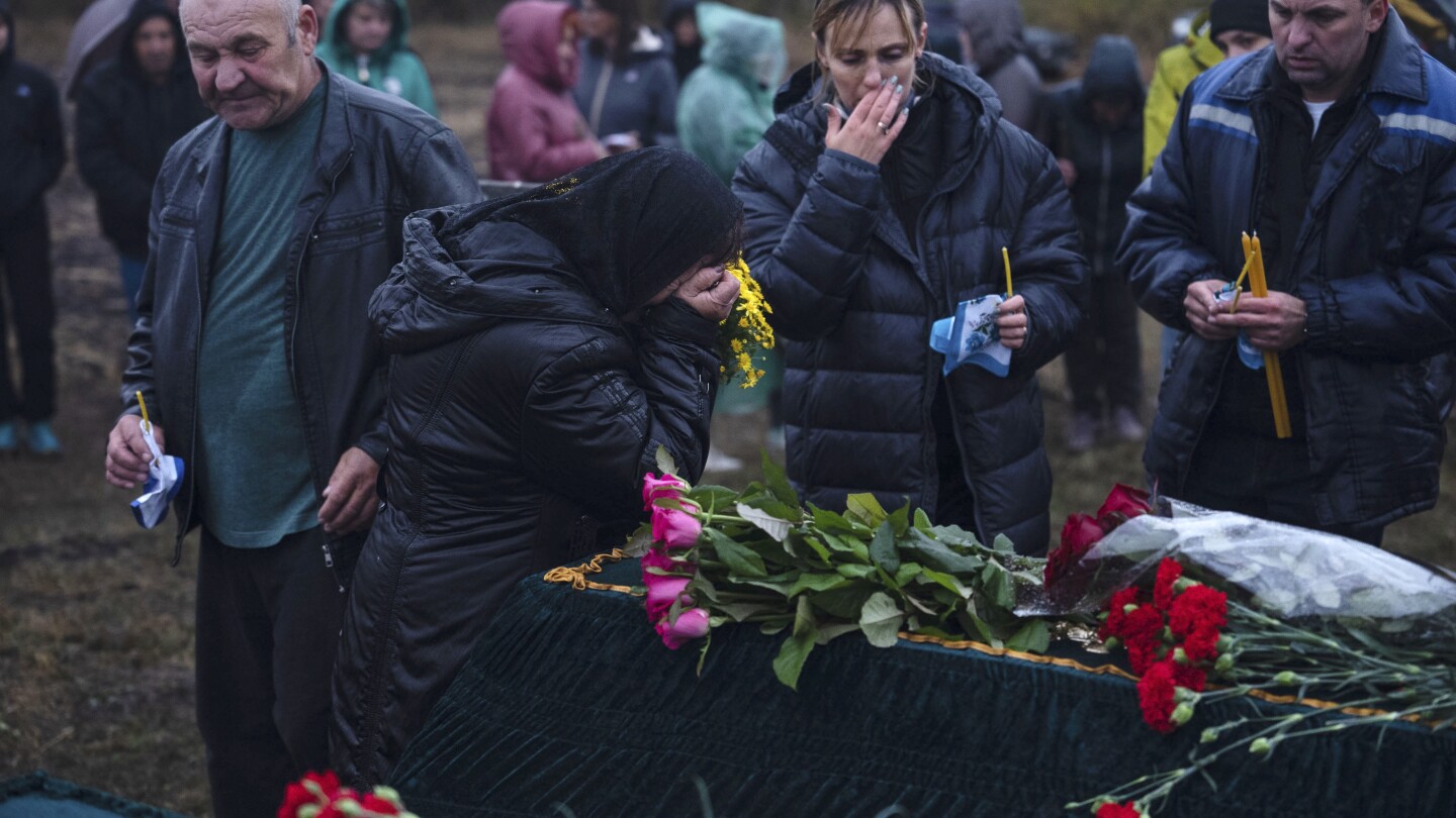 Days after deadly missile strike on Ukrainian cafe, grief and a search for answers | AP News