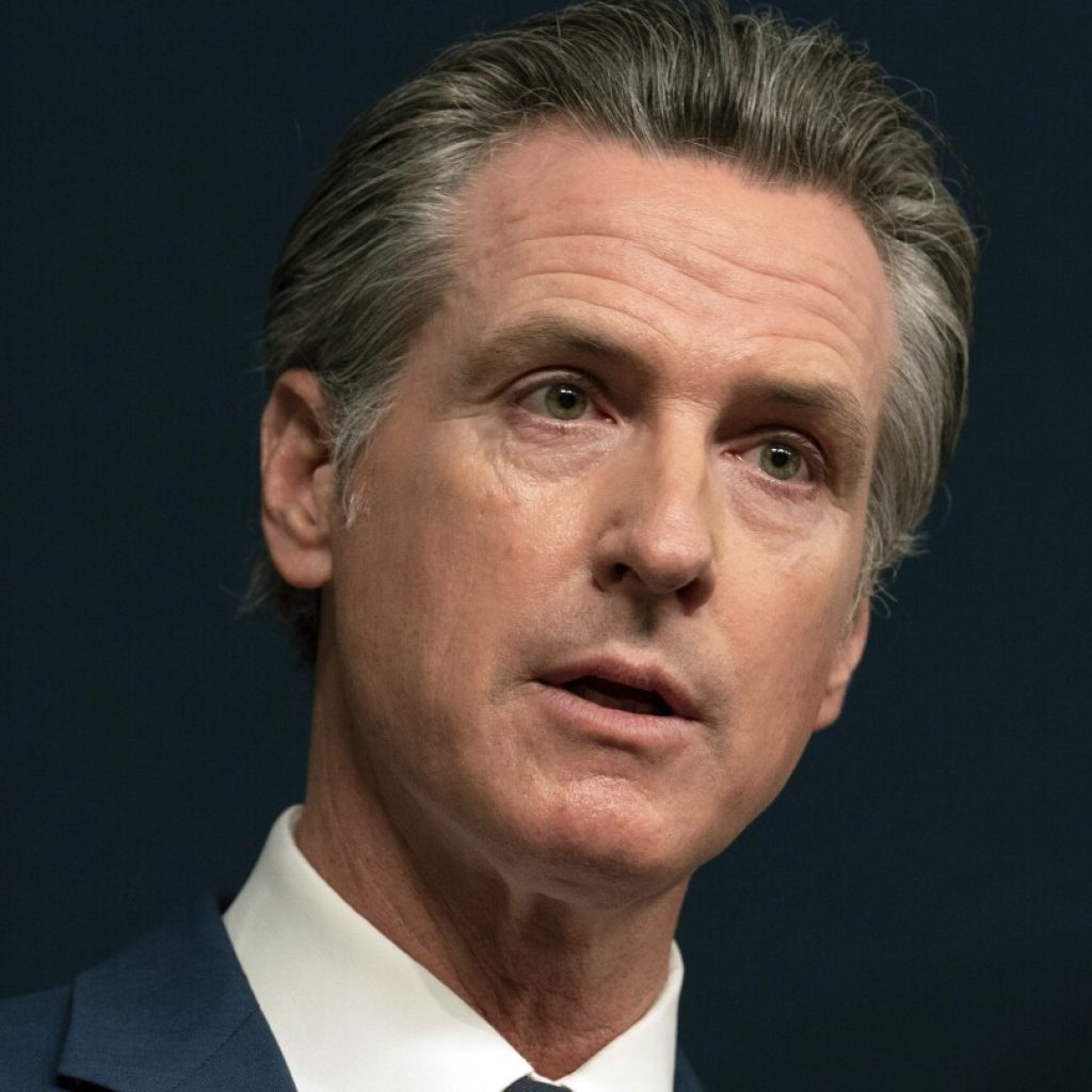 California Gov. Gavin Newsom signs law requiring big businesses to disclose emissions | AP News