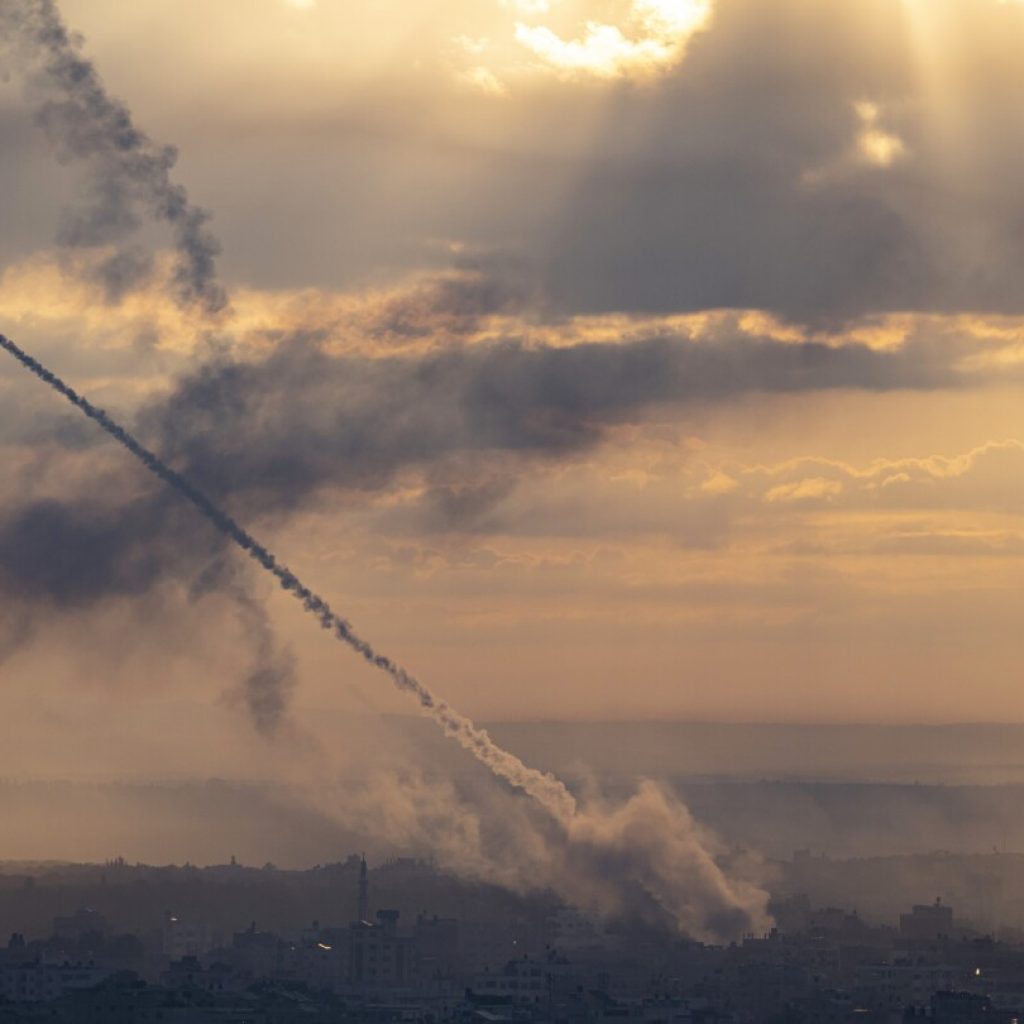 Hamas fighters storm Israeli towns in surprise attack; Israel responds with deadly strikes on Gaza | AP News