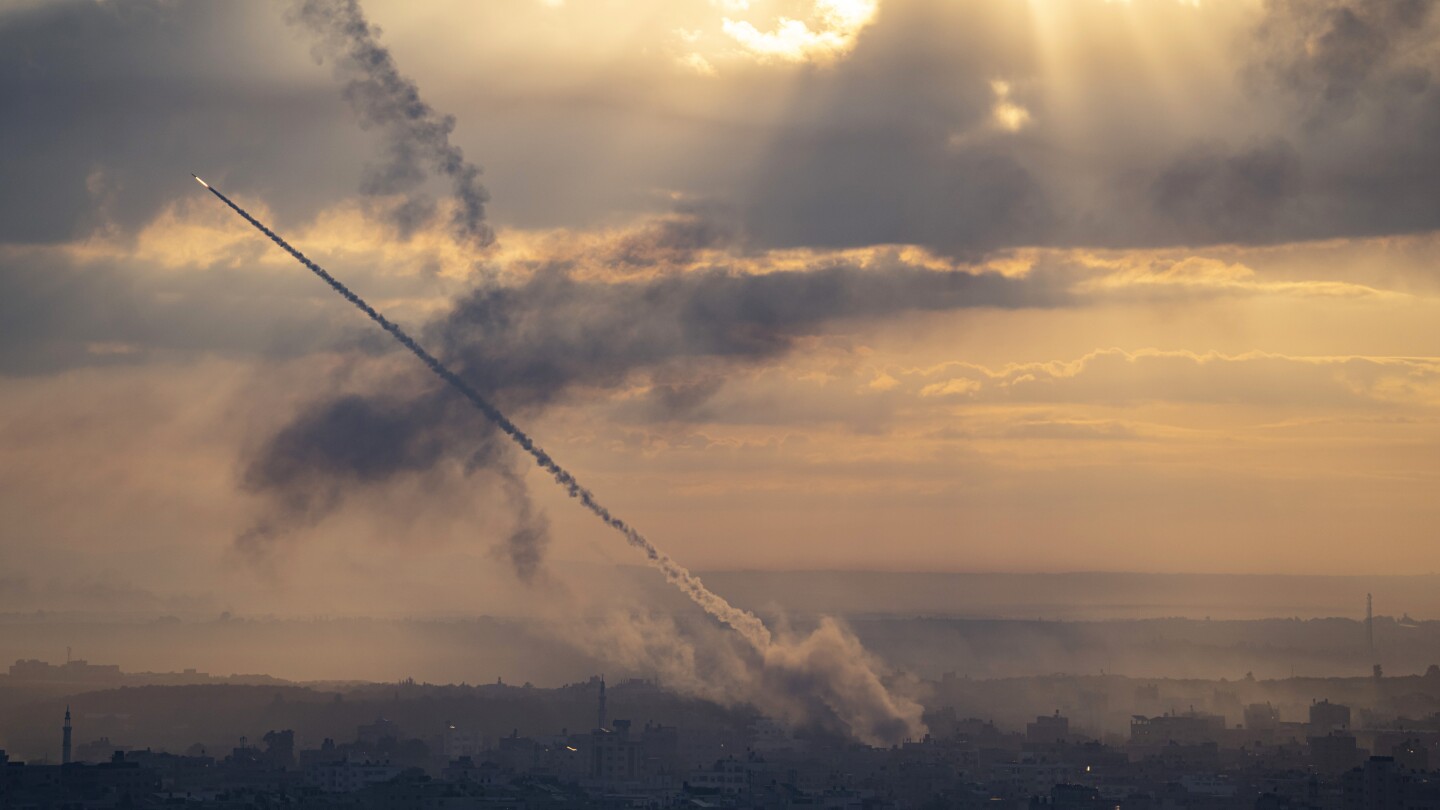 Hamas fighters storm Israeli towns in surprise attack; Israel responds with deadly strikes on Gaza | AP News