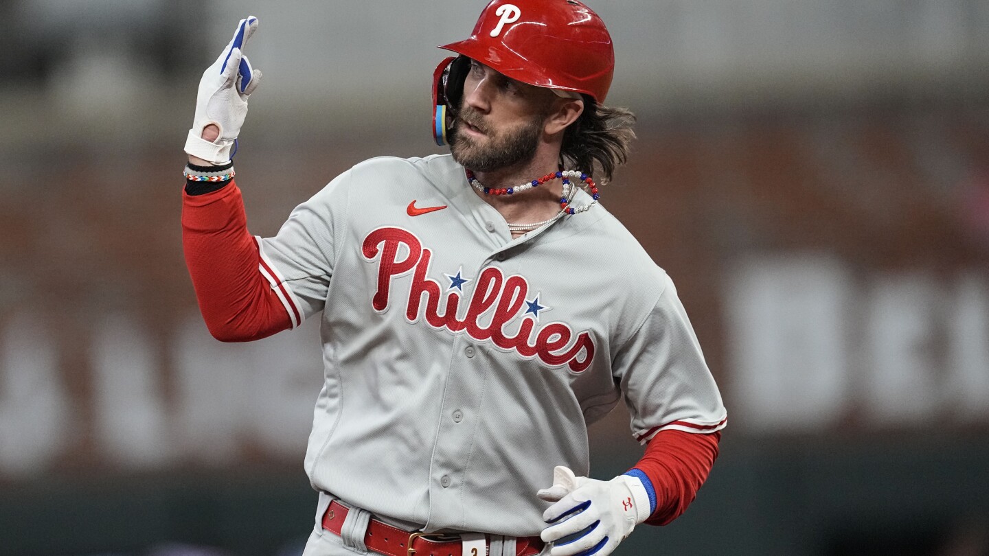 Harper homers, Phillies shut down slugging Braves 3-0 in Game 1 of NLDS | AP News