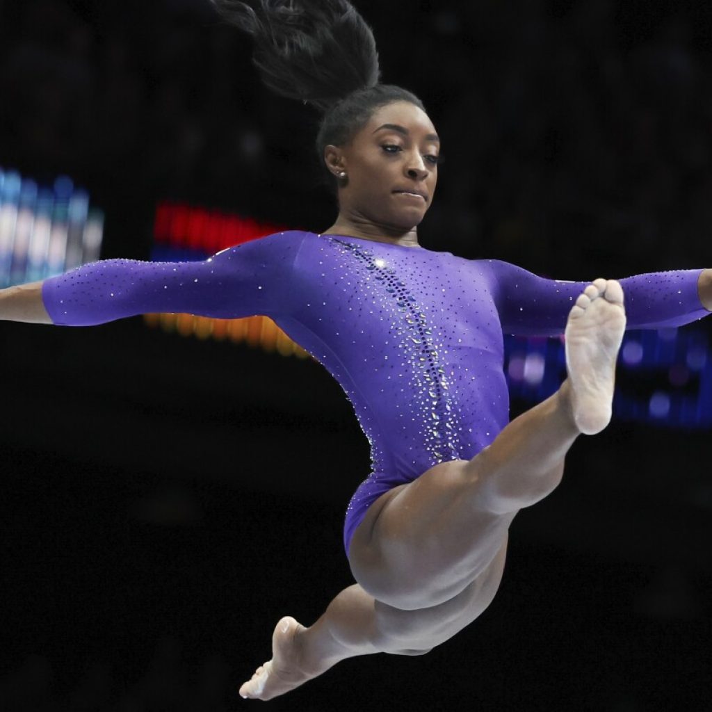 Another one for Biles: American superstar gymnast wins 22nd gold medal at world championships | AP News