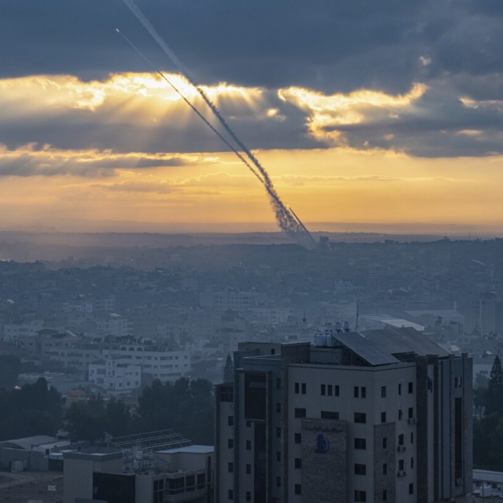 Hamas attack at music festival led to chaos and frantic attempts to escape or hide | AP News