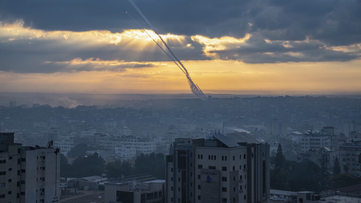 Hamas attack at music festival led to chaos and frantic attempts to escape or hide | AP News