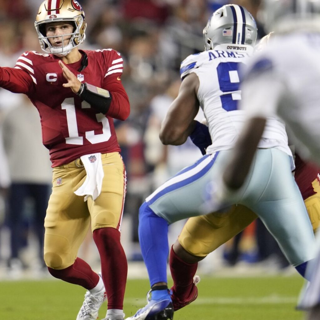 Brock Purdy throws 4 TD passes to lead the 49ers past the Cowboys 42-10 | AP News