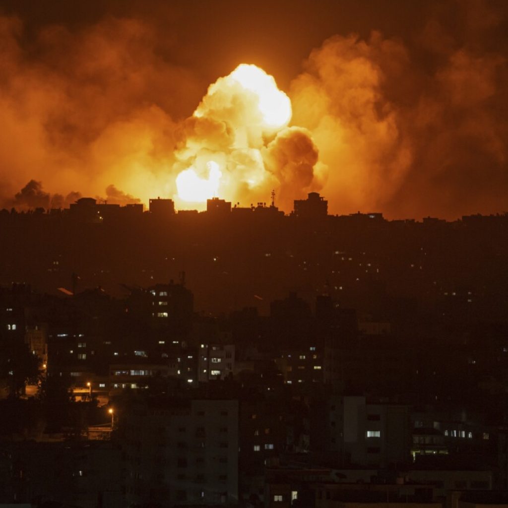 Israel steps up Gaza bombing and battles Hamas militants as deaths cross 1,100 | AP News