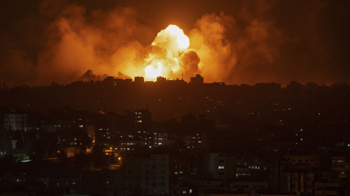 Israel steps up Gaza bombing and battles Hamas militants as deaths cross 1,100 | AP News