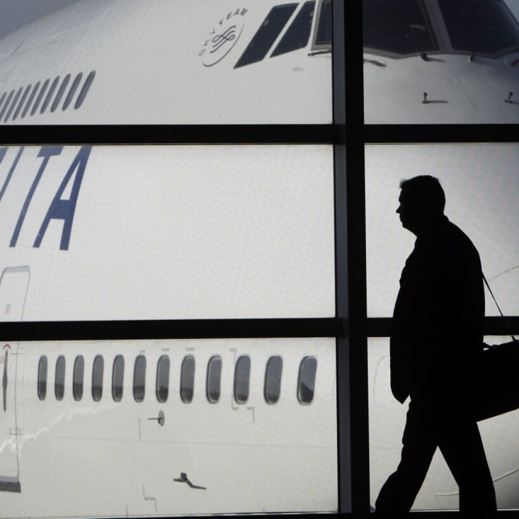 Airlines halt flights in and out of Israel after a massive attack by Hamas ignites heavy fighting | AP News