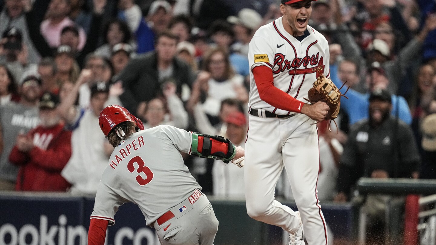 Braves rally for 5-4 win over Phillies on d’Arnaud, Riley homers and game-ending double play | AP News