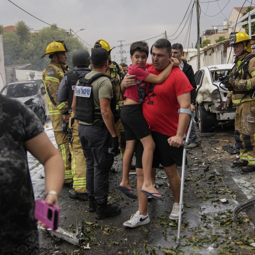 Israel strikes downtown Gaza City and calls up 300,000 reservists after Hamas attack | AP News