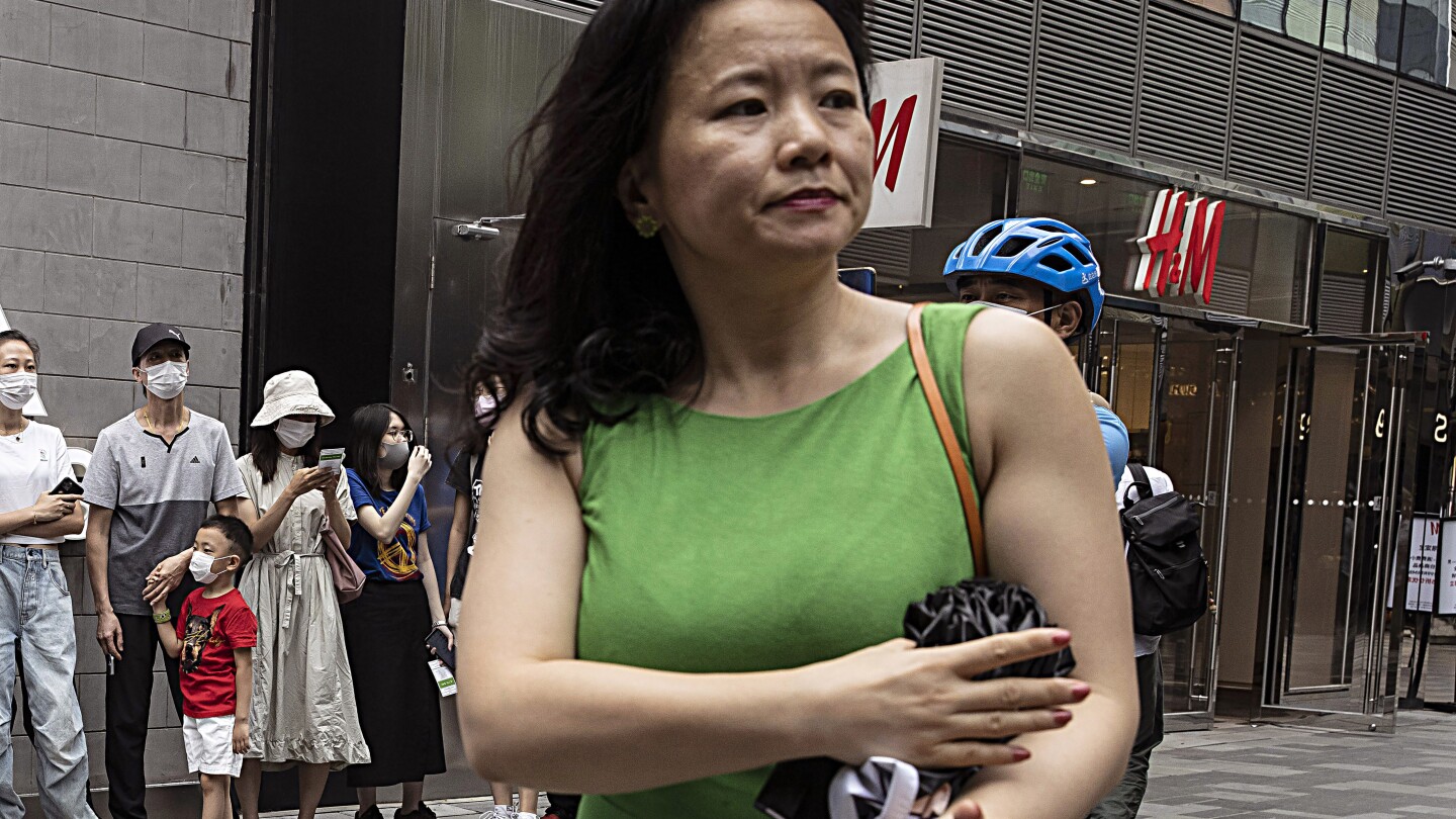 Australian-Chinese journalist detained for 3 years in China returns to Australia | AP News