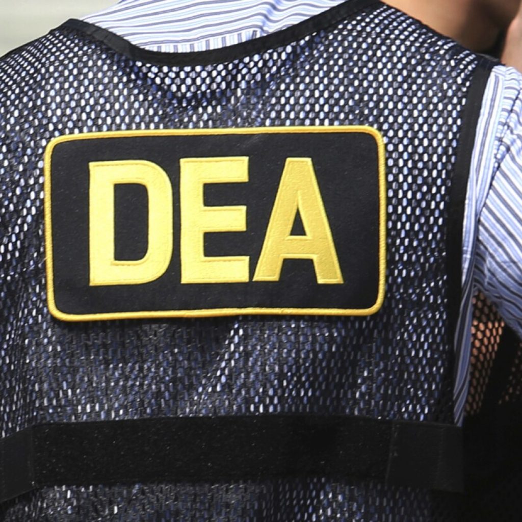 Shadowy snitch takes starring role in bribery trial of veteran DEA agents | AP News