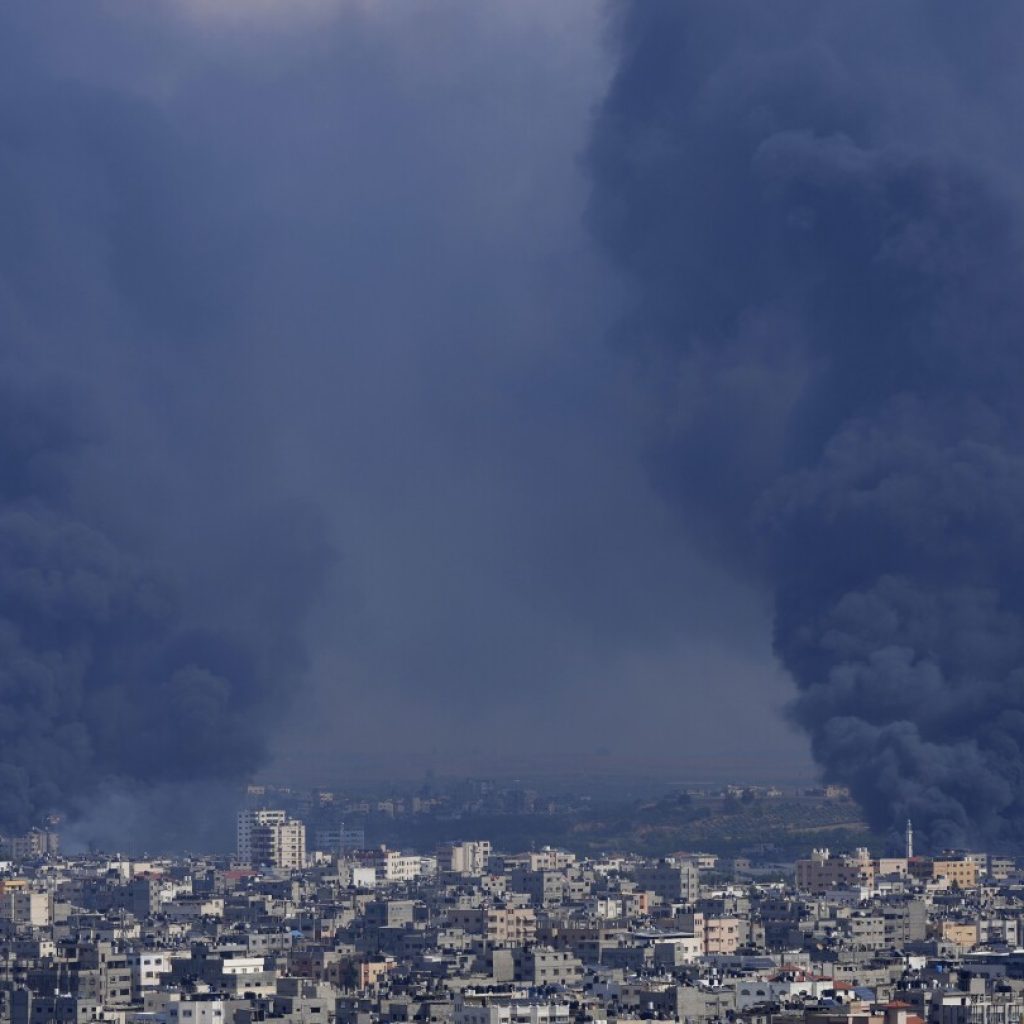 AP PHOTOS: Rockets sail and tanks roll in Israeli-Palestinian war’s 5th day | AP News