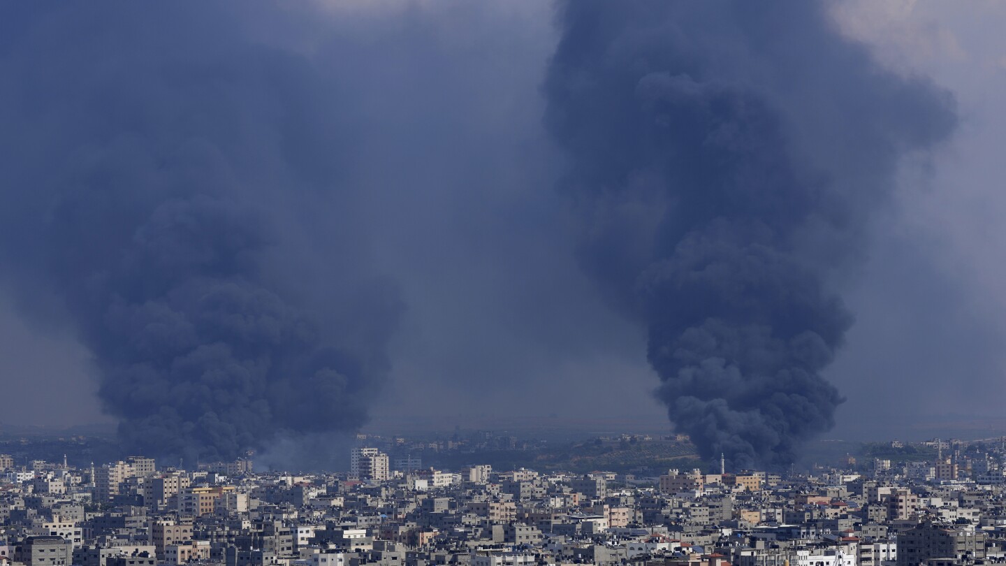 AP PHOTOS: Rockets sail and tanks roll in Israeli-Palestinian war’s 5th day | AP News