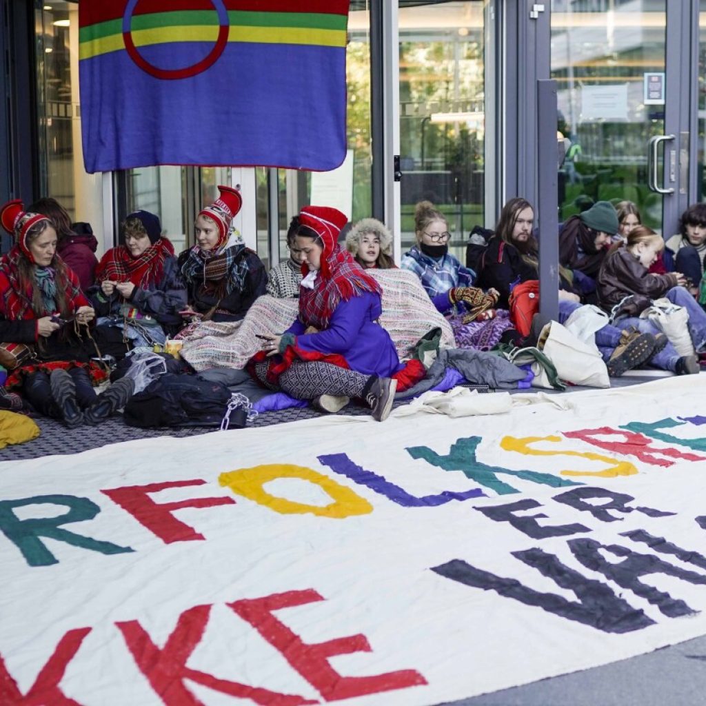 Norway activists press on with their protest against wind farm on land used by herders | AP News