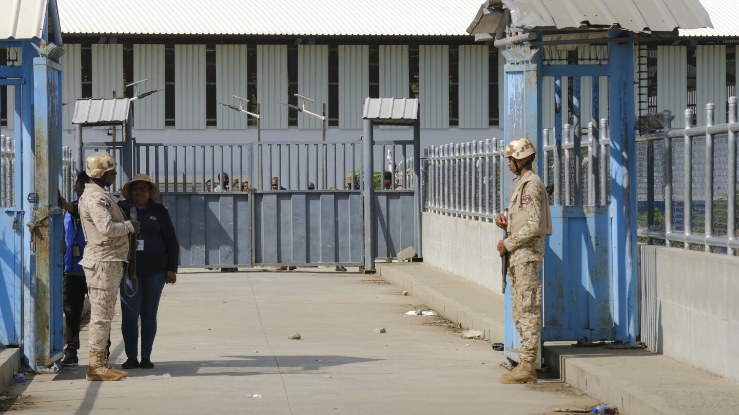 Haiti refuses to open key border crossing with Dominican Republic in spat over canal | AP News