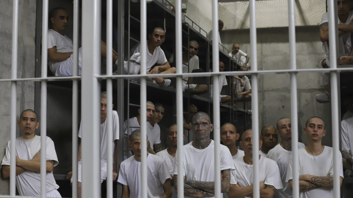 El Salvador is gradually filling its new mega prison with alleged gang members | AP News