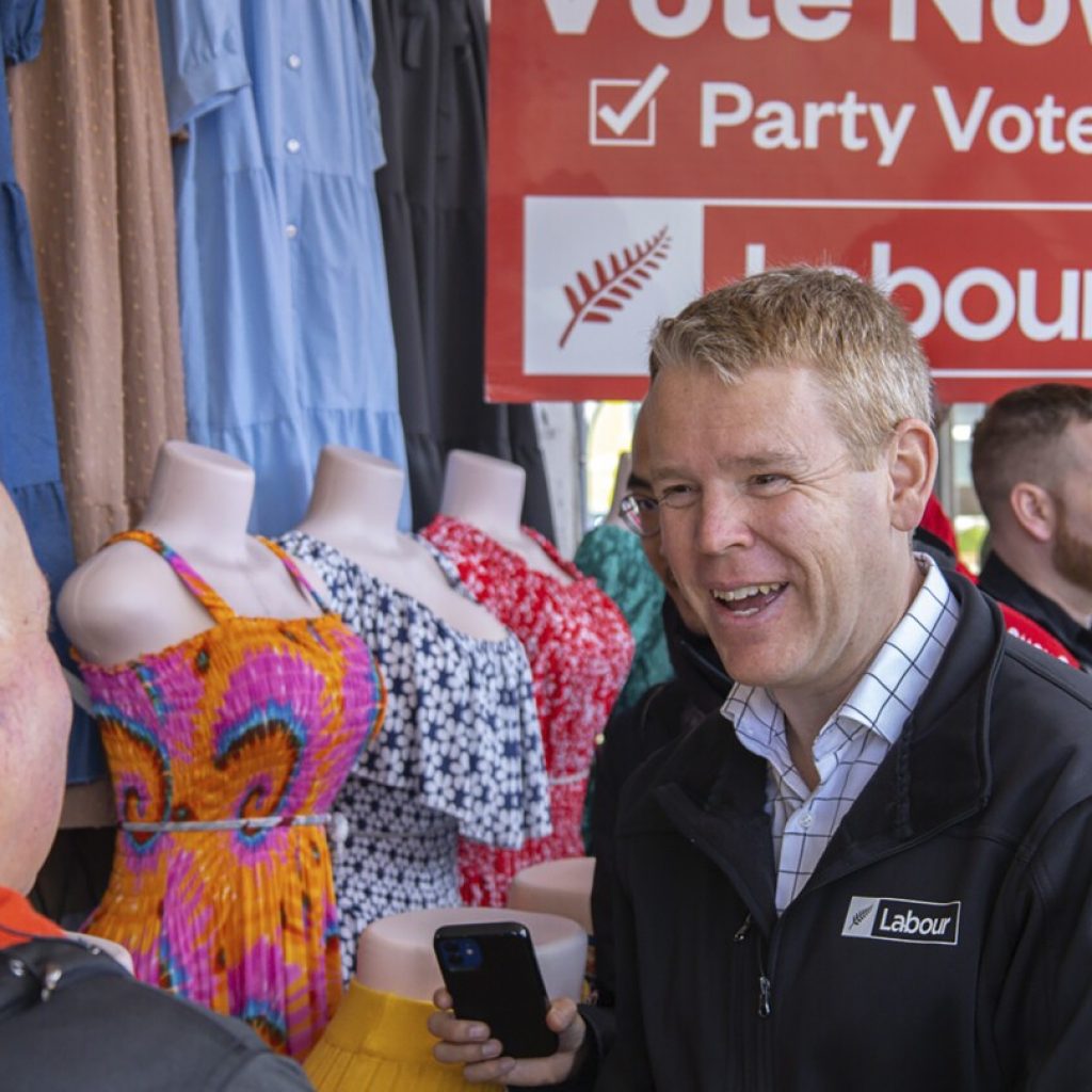 New Zealand political candidates dance and hug on the final day of election campaign | AP News