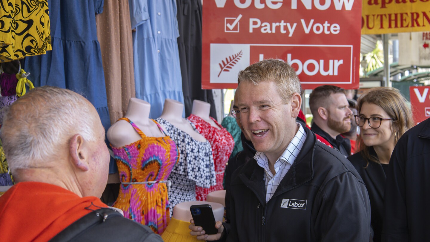 New Zealand political candidates dance and hug on the final day of election campaign | AP News