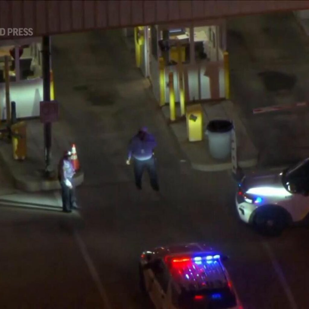 Shooting at Philadelphia International Airport garage kills 1 police officer and wounds another | AP News