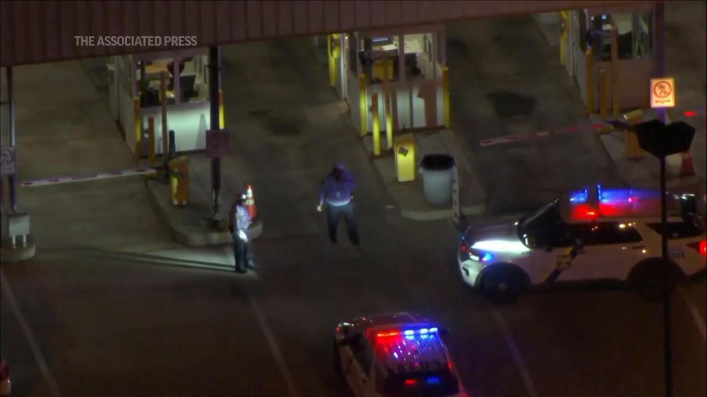 Shooting at Philadelphia International Airport garage kills 1 police officer and wounds another | AP News