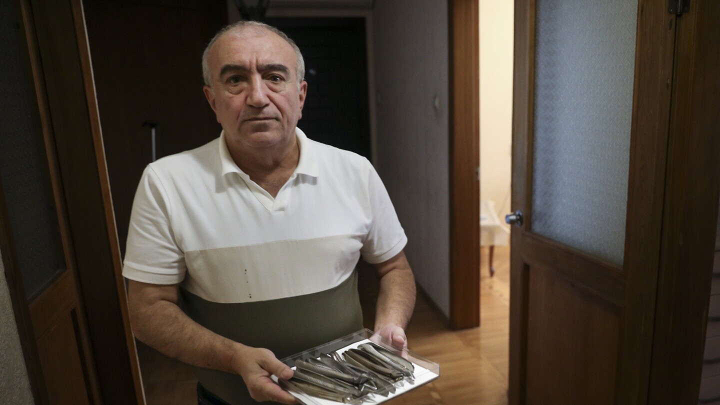 Azerbaijanis who fled a separatist region decades ago ache to return, but it could be a long wait | AP News