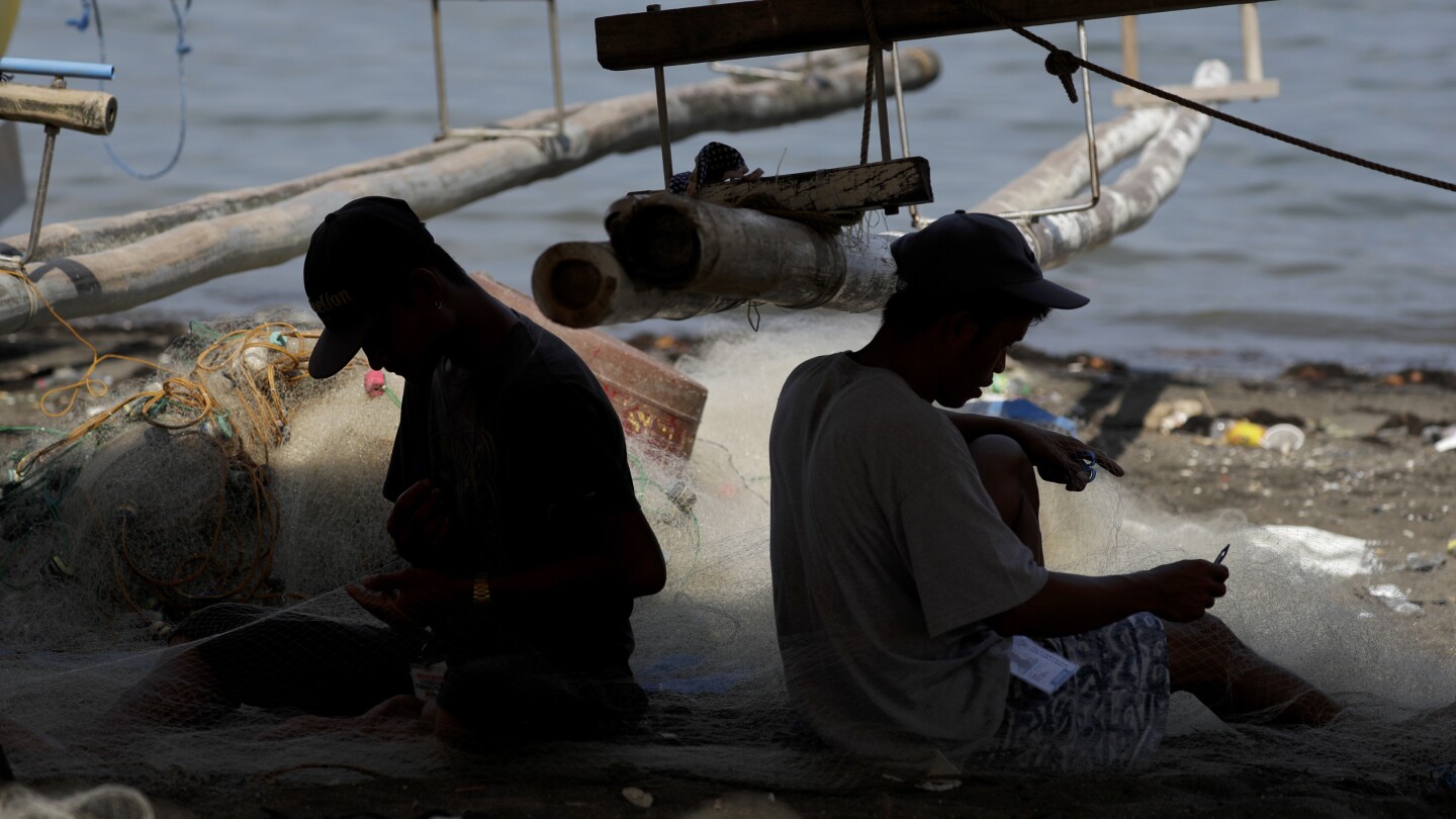 Canada forges agreement to help Philippines track illegal fishing vessels using satellite technology | AP News