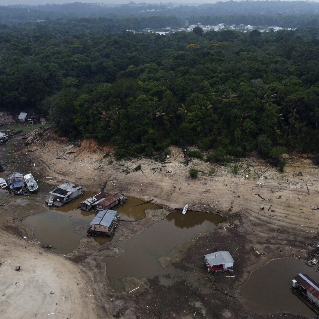 In Brazil’s Amazon, rivers fall to record low levels during drought | AP News