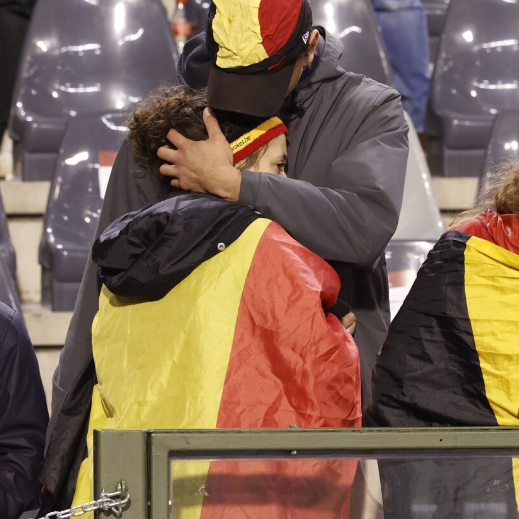 Soccer match between Belgium and Sweden suspended after deadly shooting in Brussels | AP News