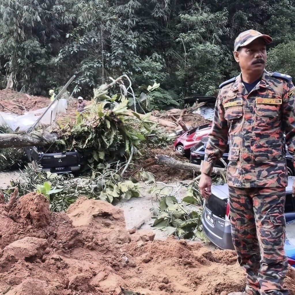 Malaysia says landslide that killed 31 people last year was caused by heavy rain, not human activity | AP News