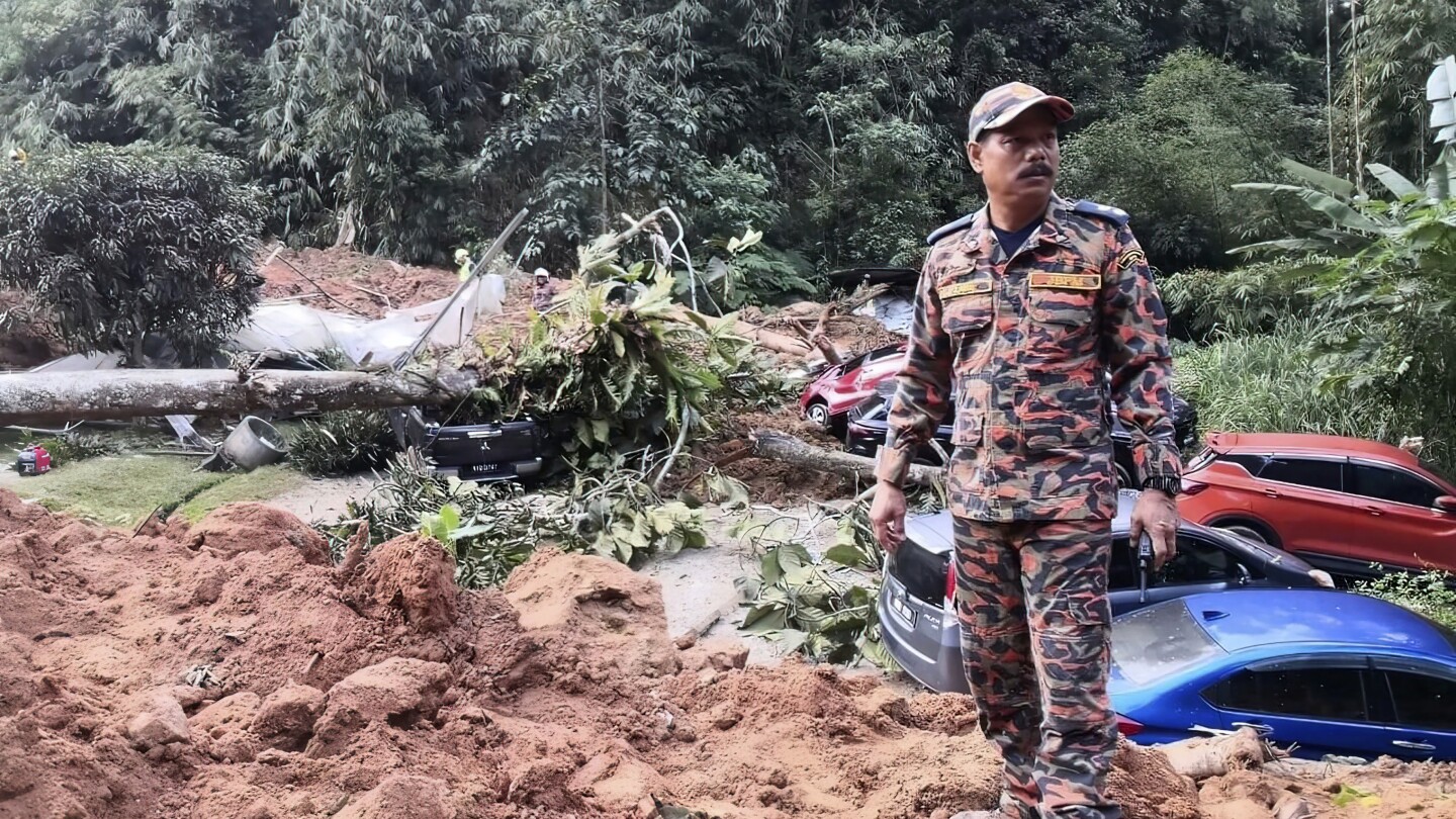 Malaysia says landslide that killed 31 people last year was caused by heavy rain, not human activity | AP News