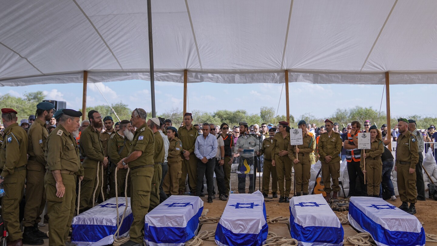 Hundreds mourn as Israeli family of 5 that was slain together is laid to rest | AP News