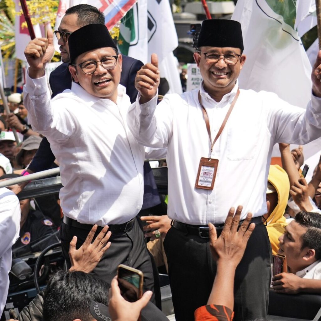 Indonesian presidential candidates register for next year’s elections as supporters cheer | AP News