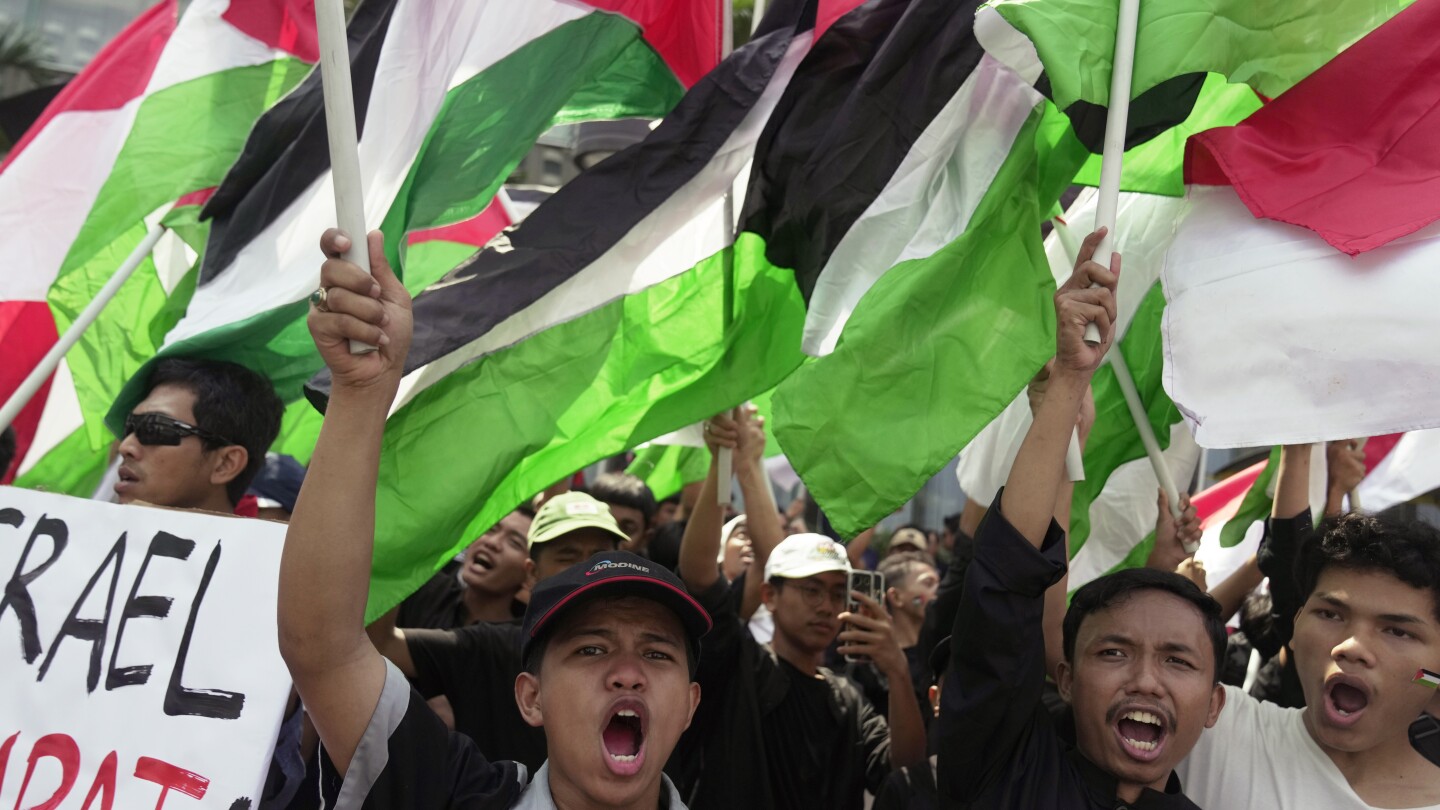 Protesters march to US Embassy in Indonesia over Israeli airstrikes | AP News