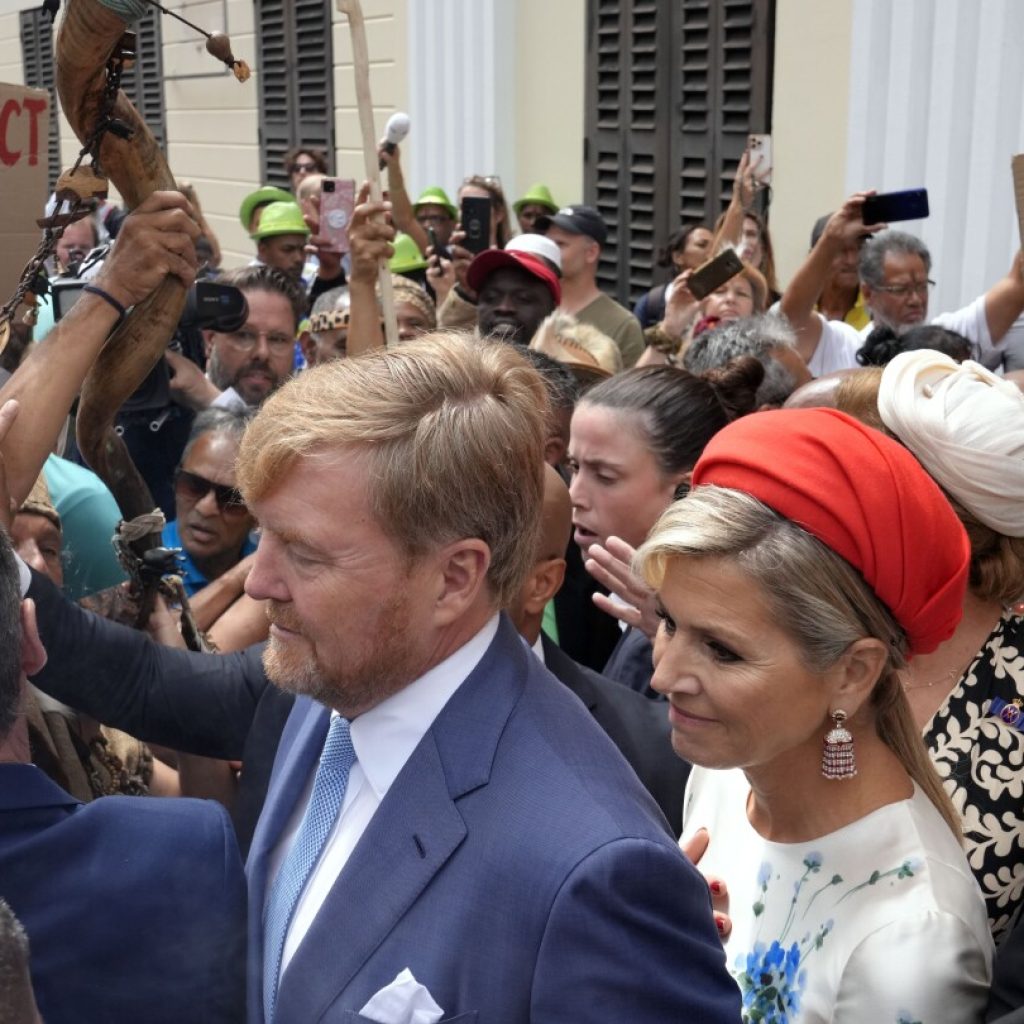 Dutch king and queen are confronted by angry protesters on visit to a slavery museum in South Africa | AP News