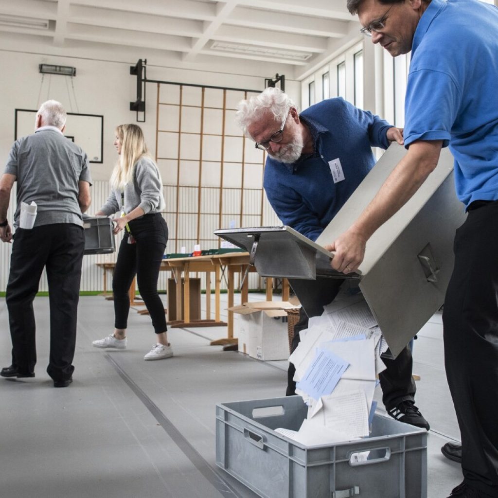 Swiss elect their parliament on Sunday with worries about environment and migration high in minds | AP News