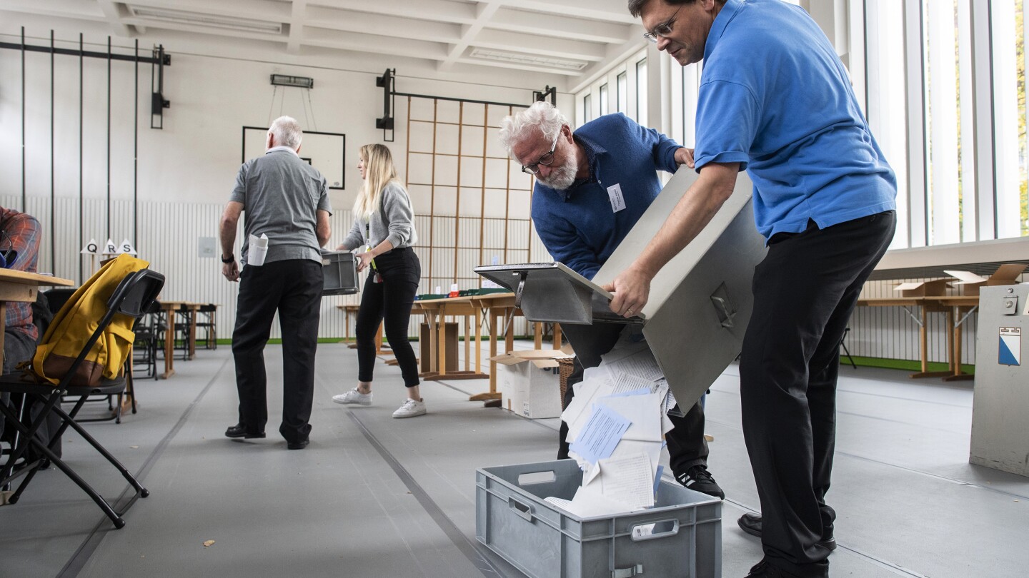 Swiss elect their parliament on Sunday with worries about environment and migration high in minds | AP News