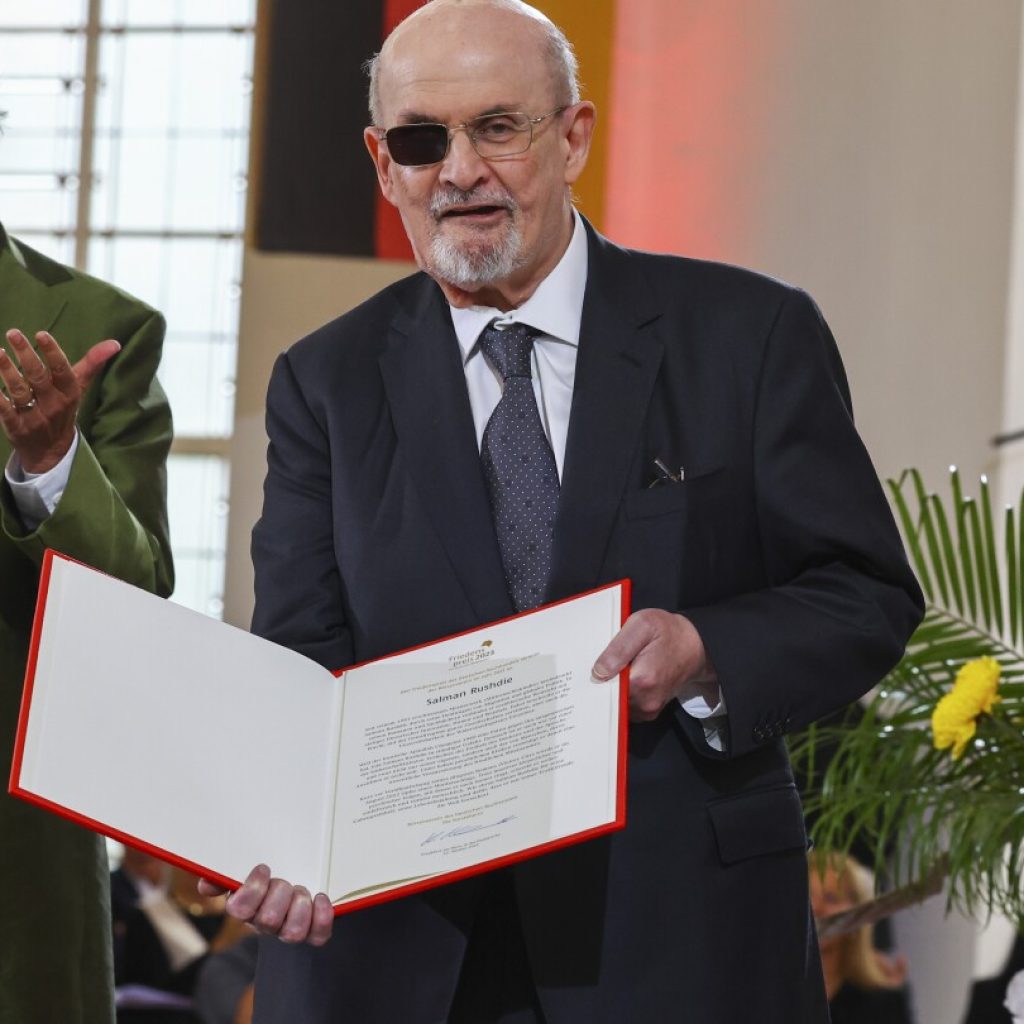 Author Salman Rushdie calls for defense of freedom of expression as he receives German prize | AP News