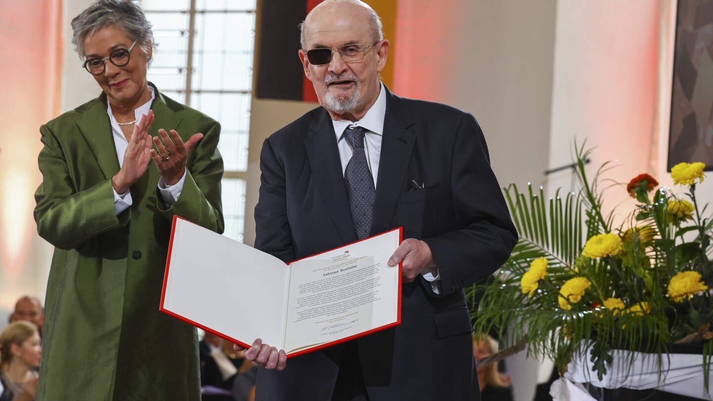 Author Salman Rushdie calls for defense of freedom of expression as he receives German prize | AP News