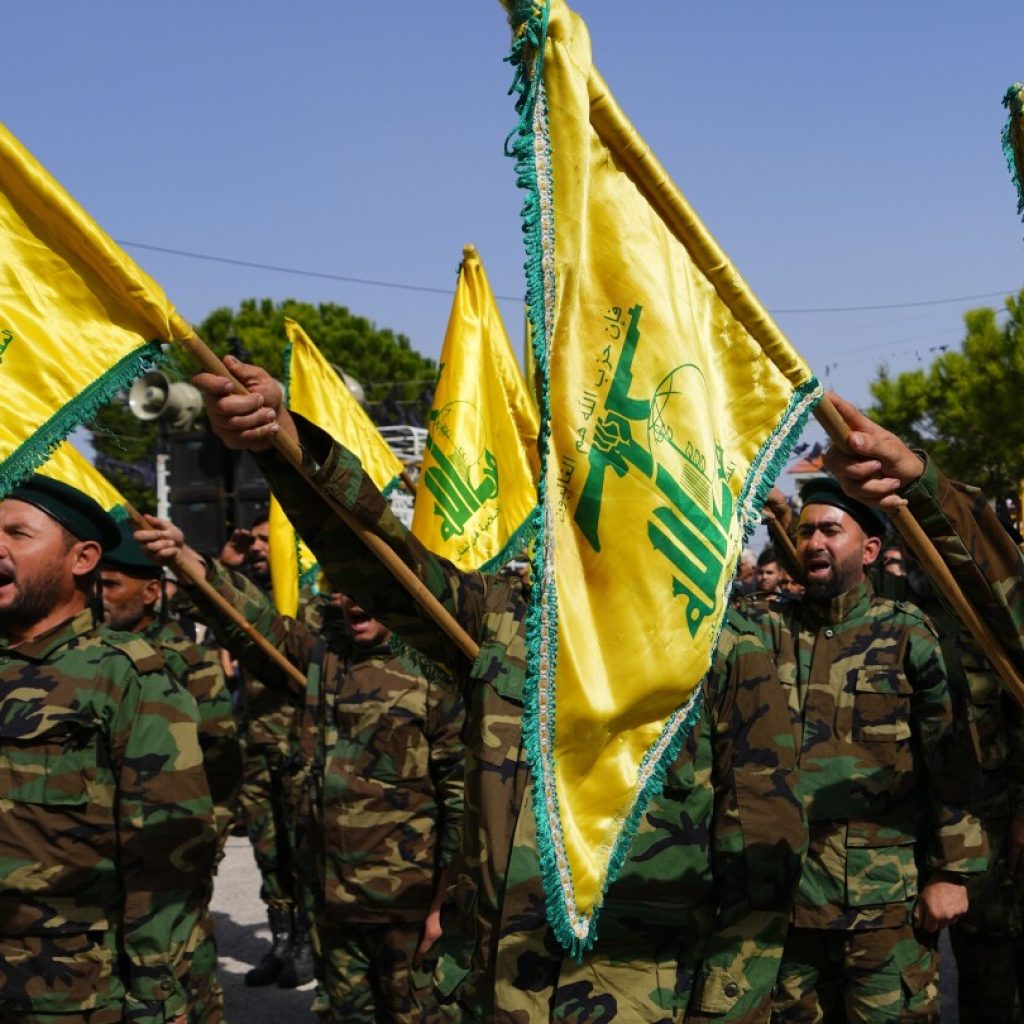 Hezbollah and Israel exchange fire and warnings of a widened war | AP News