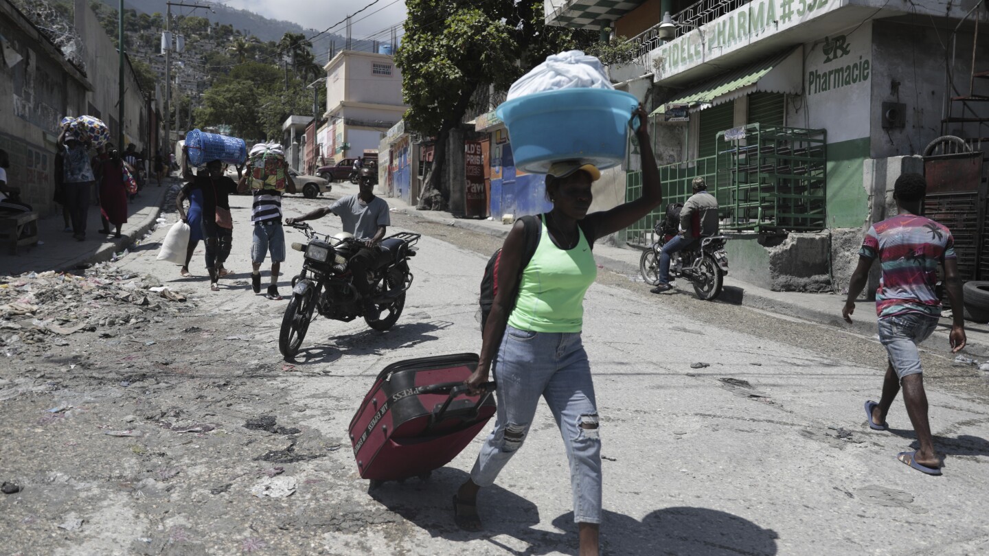 Growing gang violence is devastating Haitians, with major crime at a new high, UN envoy says | AP News